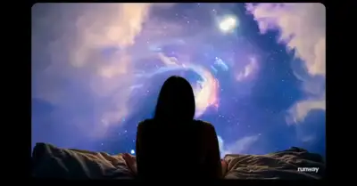 Person on Bed Under Spectacular Night Sky