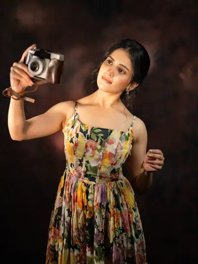 Ultra-Photorealistic Portrait of Indian Woman with Camera