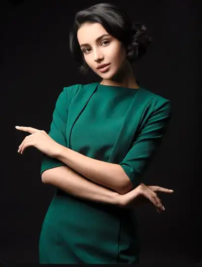Elegant Woman in Green Dress Studio Portrait