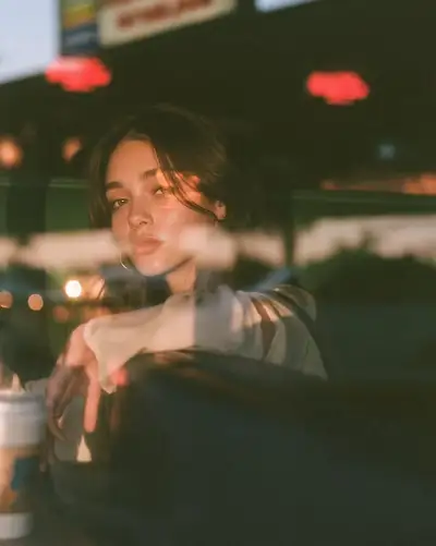 Cinematic Cafe Window Portrait at Blue Hour