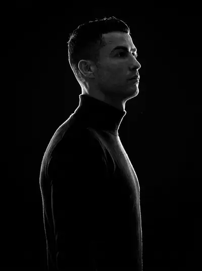 Minimalist black and white two-person side profile portrait
