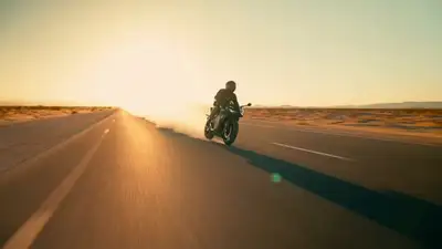 Desert Motorcycle Dawn Tracking Shot