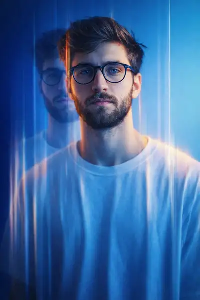 Cinematic multi-exposure portrait with blue gradient glow