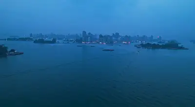 Dense Vertical Lake City at Dusk