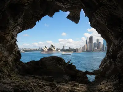 Cave Opening Shaped Like a Country With Landmark View