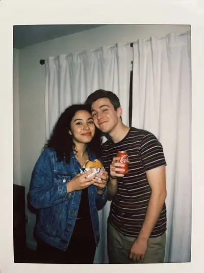 Polaroid-Style Couple Photo with Burger and Coca-Cola