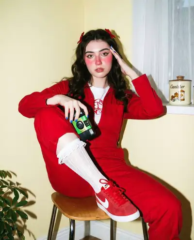 Vintage Retro Photo of Young Woman with Camera