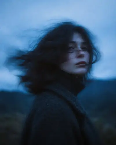 Cinematic Moody Portrait of Woman in Wool Coat