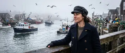 Foggy fishing village portrait of a woman by the harbor