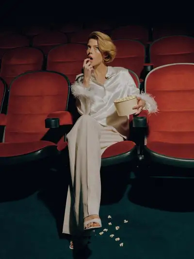 Elegant Fashion Editorial in Movie Theater