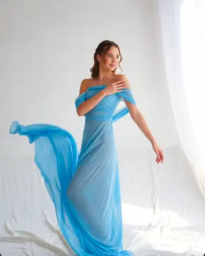 Elegant Woman in Blue Gown Studio Session