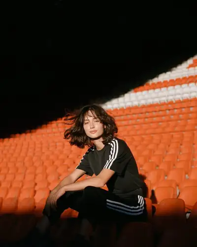 Sports editorial portrait prompt in an empty stadium