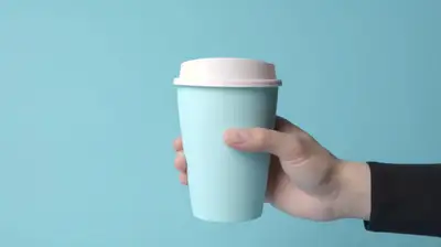 Product Mockup in Hand Holding Cup