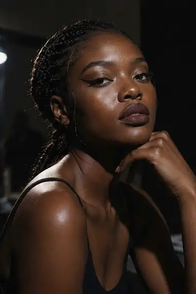 High-Contrast Beauty Close-Up of Nigerian Model Backstage