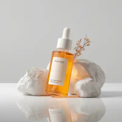 Symmetrical serum bottle shot with golden backlight on stones