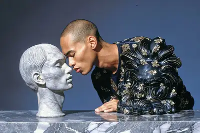 Man Kissing Marble Statue of His Own Head