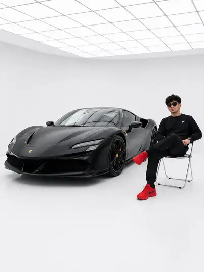 Matte Black Ferrari in Minimal White Studio