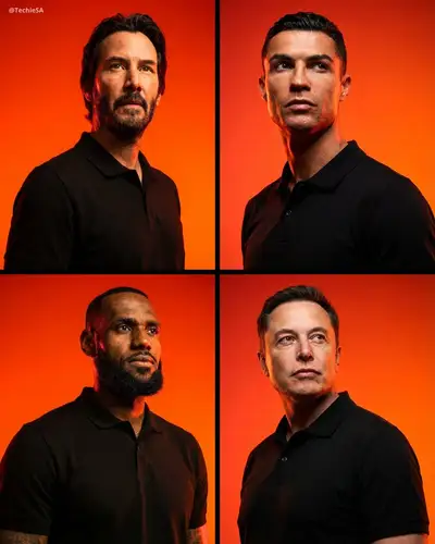 Dramatic orange-red studio portrait with low-angle heroic lighting