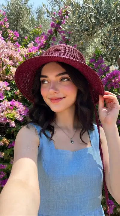 Sunny Portrait with Maroon Hat and Bougainvillea