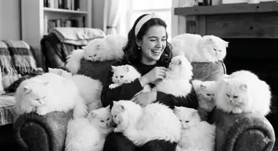 Black and White Woman with Persian Cats