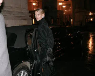Late-arriving companion photograph: luxury black silk at the opera