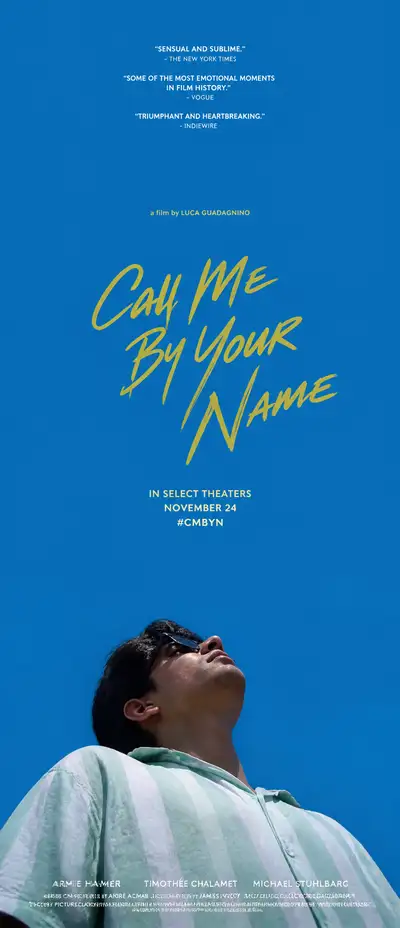 Movie-poster style portrait with vast color field and upward gaze