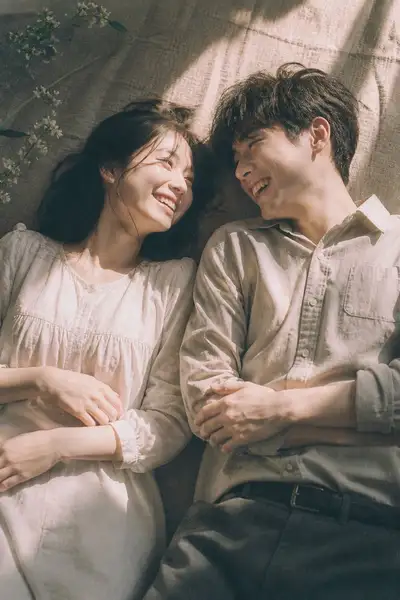 Cinematic Top-Down Portrait of a Joyful Couple