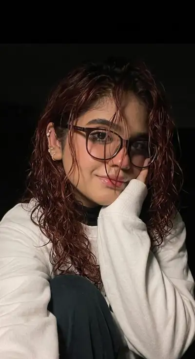 Realistic Dim-Lit Selfie Portrait Prompt