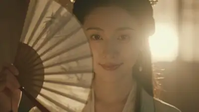 Eastern Classical Cinematic Portrait with Fan Foreground