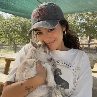Candid Portrait with Baby Goat