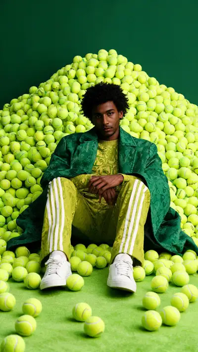 Green tennis ball mountain fashion portrait prompt