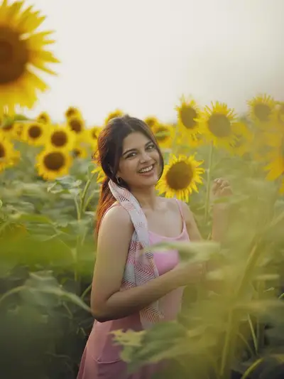 Indian Woman in Sunflower Field at Golden Hour
