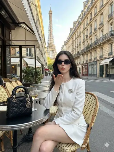 Chic Parisian cafe lifestyle portrait with the Eiffel Tower