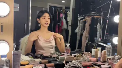 Korean idol mirror-selfie vlog in a backstage dressing room