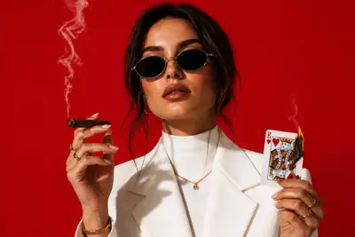 Cinematic High-Fashion Portrait with Cigar and Playing Card