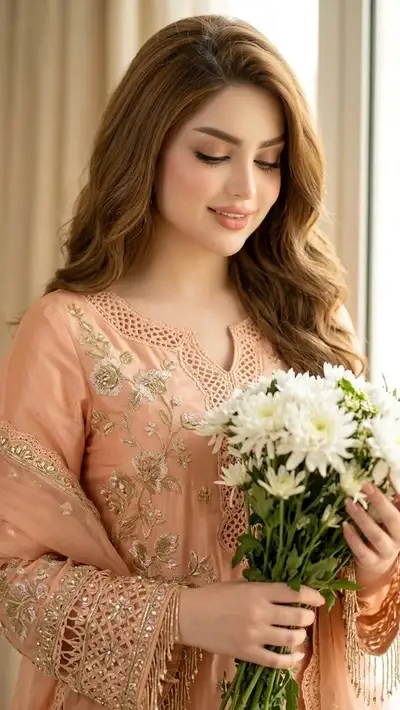 Fashion portrait with peach organza and white chrysanthemums