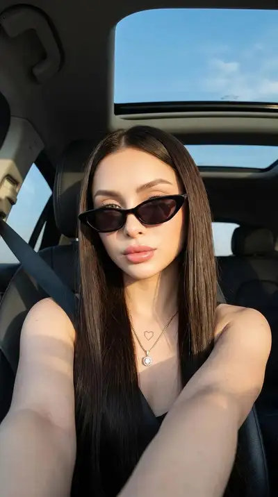 Ultra-realistic golden-hour car selfie with identity preservation