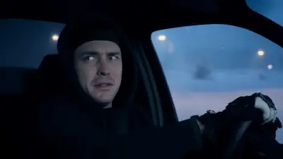 Tight Shot of Tense Driver in Black