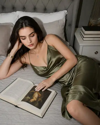 Luxury Fashion Editorial Portrait of Woman Reading in Bed