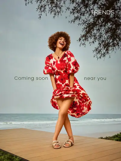 Joyful Woman on Beach Boardwalk Fashion Photo