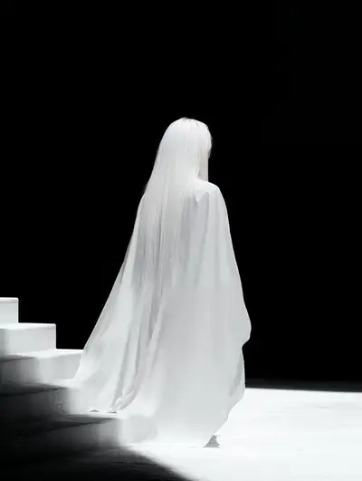Editorial Back Shot of Woman in White Dress