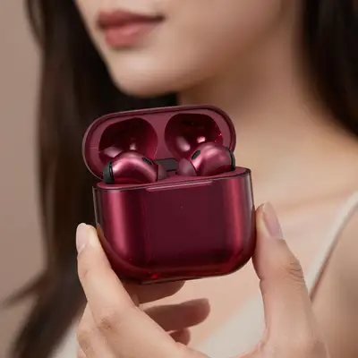 High-end macro shot of maroon earbuds case with bokeh portrait