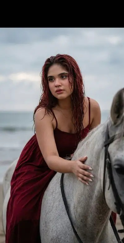 Emotional Close-Up Portrait of Woman with Horse on Beach