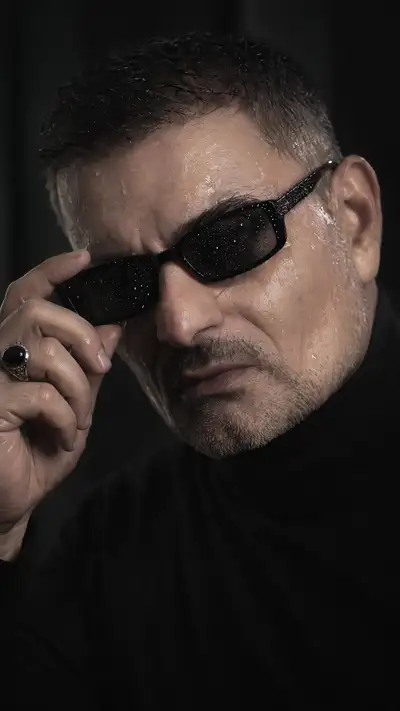 Cinematic Close-Up of a Man With Sunglasses and Wet Skin