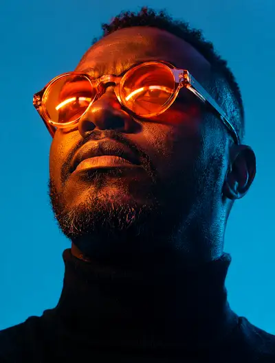 Neon cyberpunk portrait with retro sunglasses and turtleneck