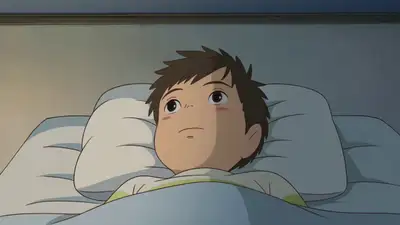 Boy in bed gazing at galaxy ceiling