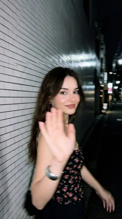 Blurry Candid Smartphone Snapshot on a Night Tokyo Sidewalk