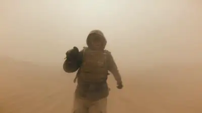 Runner Sprinting Through Sandstorm POV