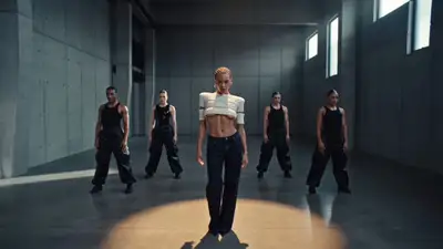 Performer with Cornrow Braids Lip-Syncing to Finished Track