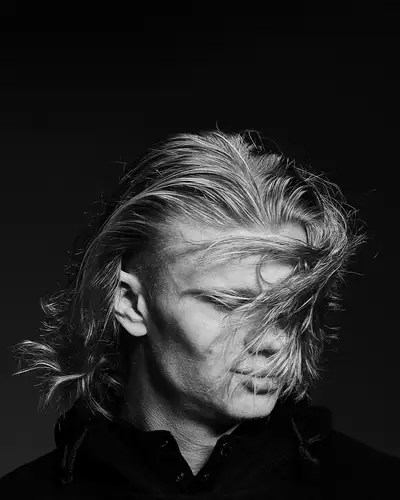 Monochrome editorial studio portrait, three angles